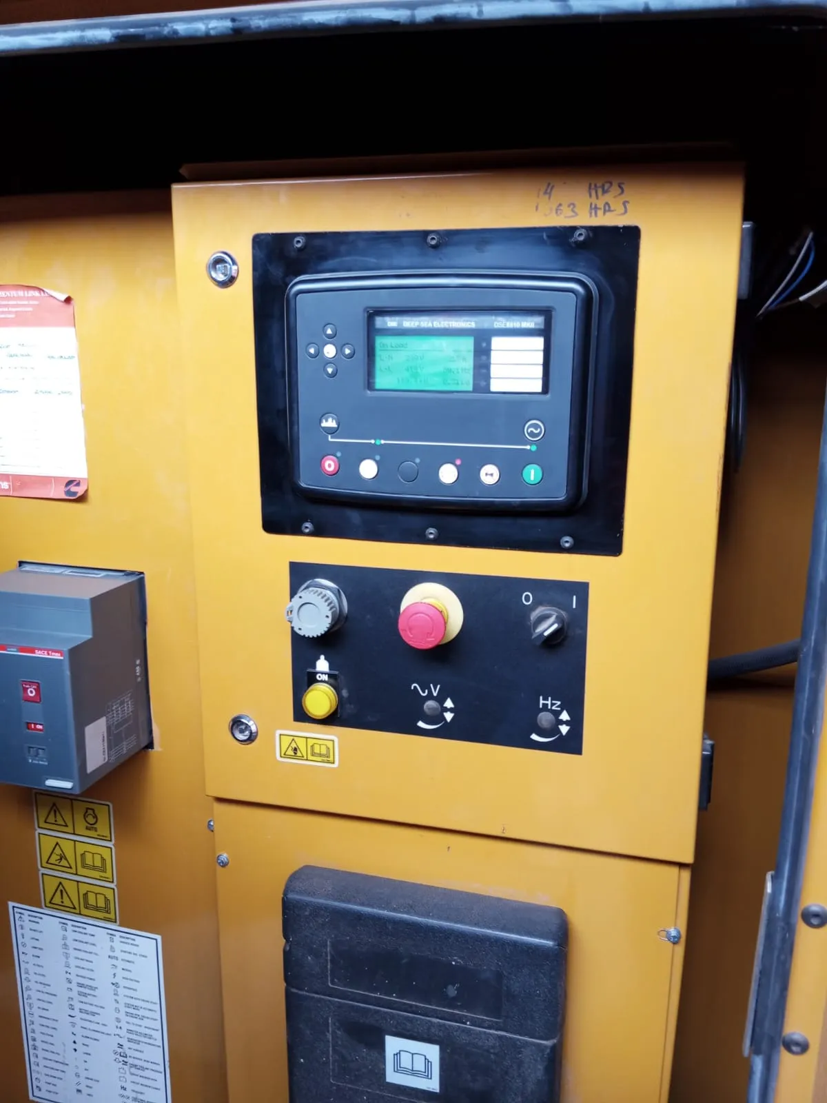 Finished generator control panel with Deep Sea controller, emergency stop and selector switches