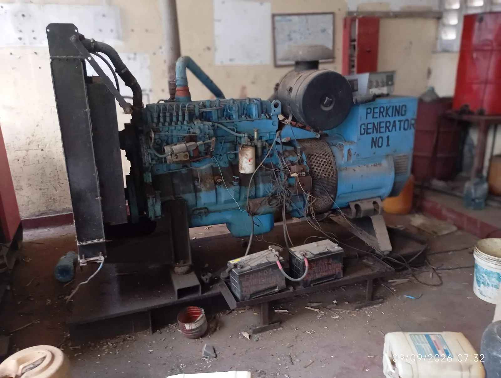 Open-frame Perkins generator set in a plant room