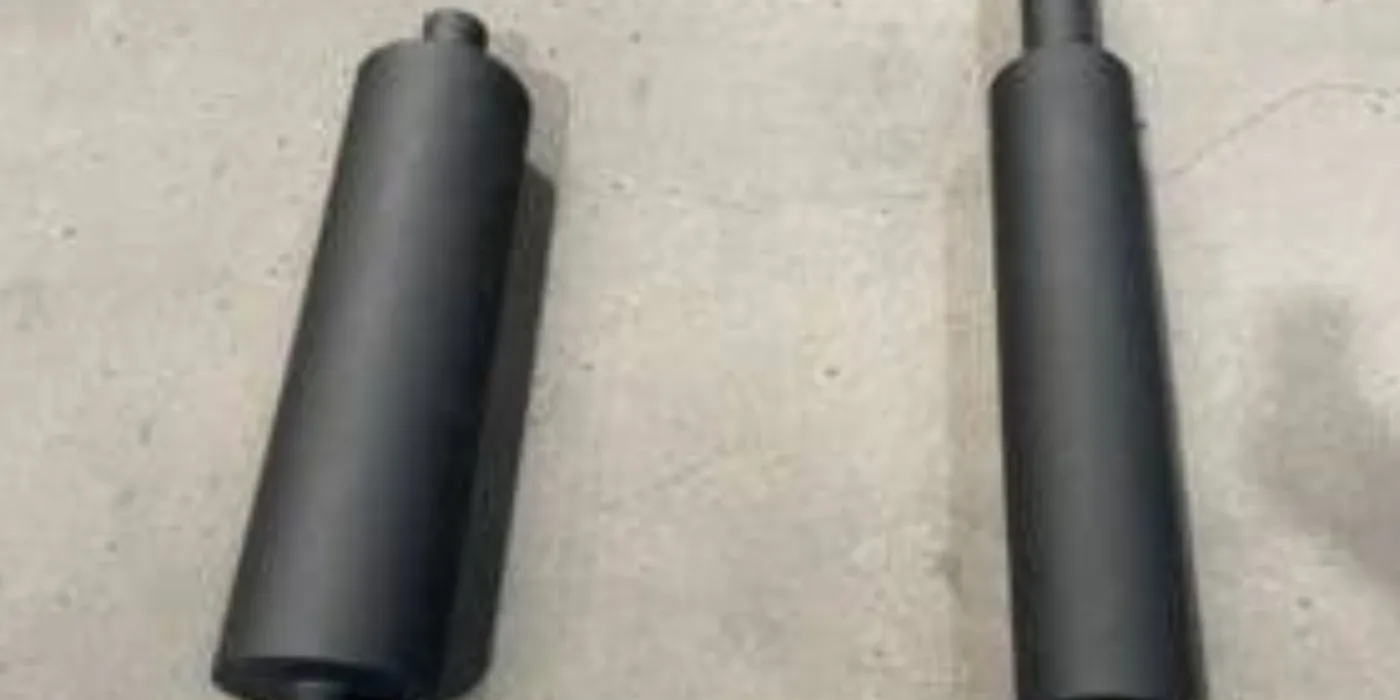 Two fabricated exhaust silencers manufactured for generator installations